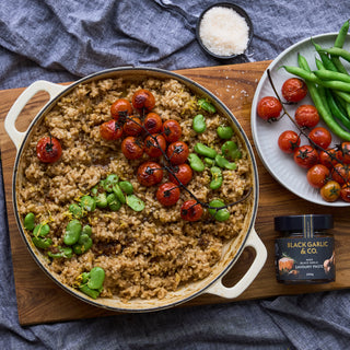 Black Garlic Risotto with oven-roasted tomato